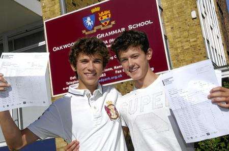 Dan Parkinson and Ross Porter collect their GCSE results at Oakwood Park Grammar School, Oakwood Park, Maidstone.
