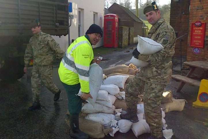 Soldiers help with sandbags in Bishopsbourne. Picture: Environment Agency