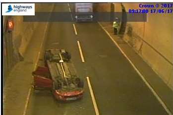 The overturned car in the Round Hill Tunnel near Folkestone. Picture: Highways England