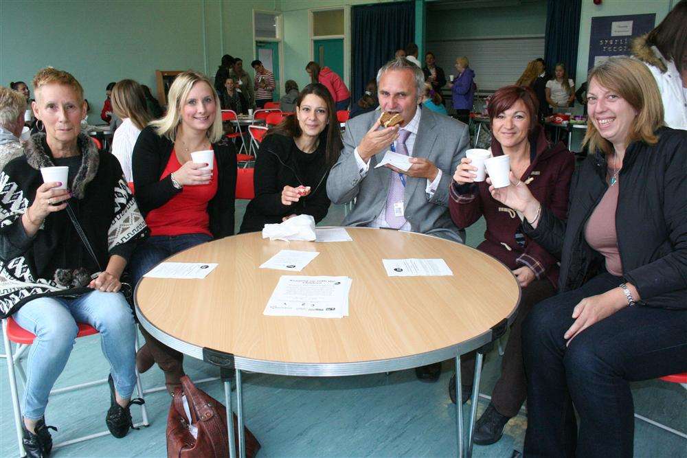 Headteacher Nigel Utton and mums at Bromstone Primary School, Broadstairs, enjoy cake and coffee in aid of Macmillan Cancer Support,