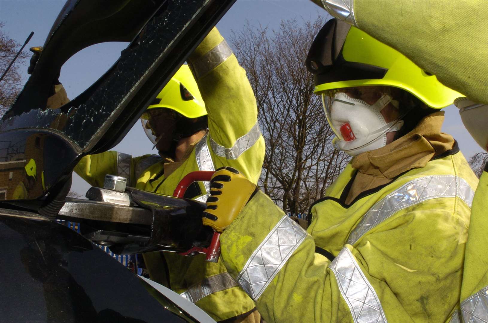 Firefighters use the Jaws of Life to cut open a car. Stock Photo. Picture: Steve Crispe