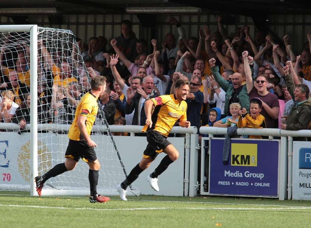 Jamie Coyle wheels away after scoring Maidstone's winner Picture: Martin Apps