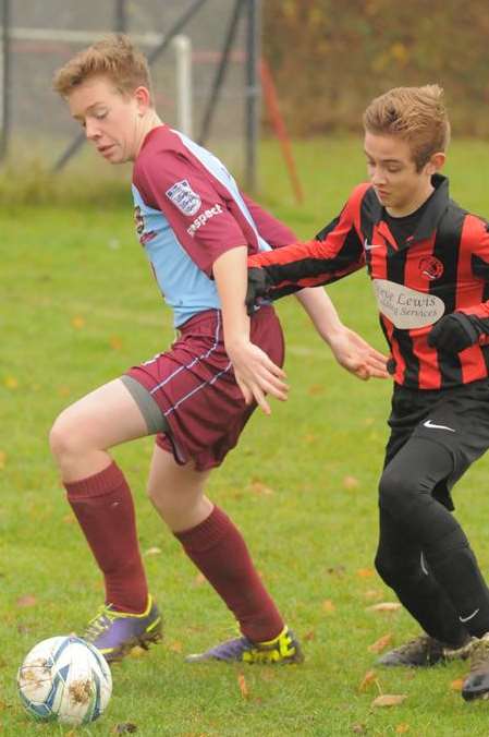 Wigmore Youth (purple) take on Meopham Colts in their Division 1 clash. Picture: Steve Crispe