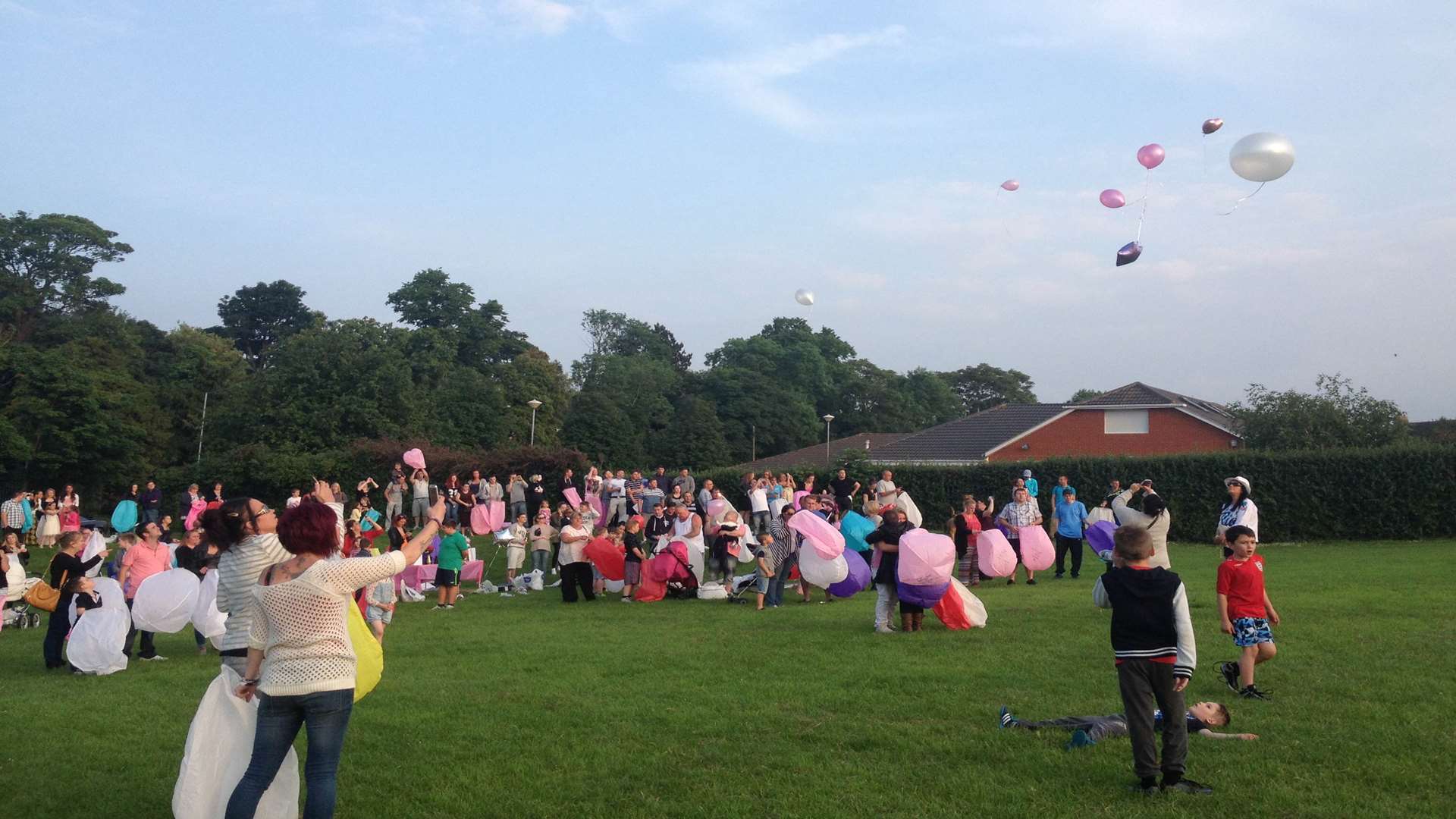 Jade's friends and family released pink balloons