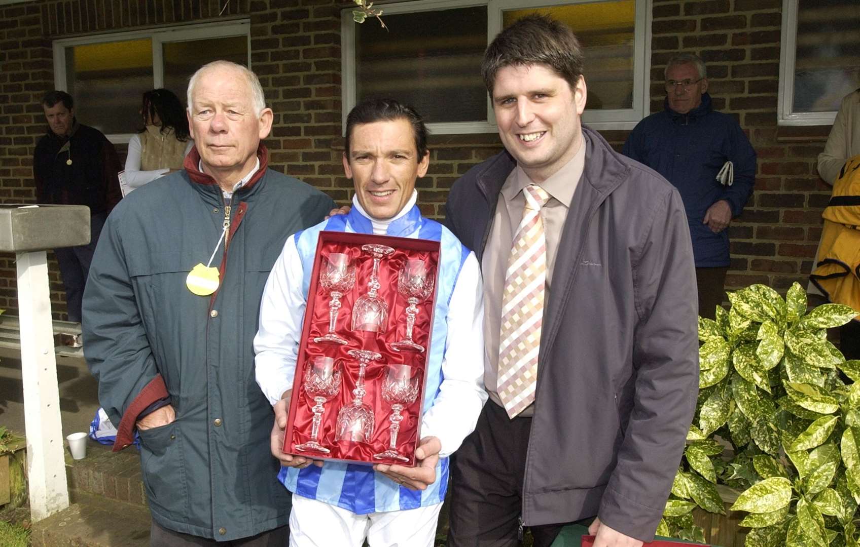 Former Kentish Express editor Leo Whitlock with winning jockey Frankie Dettori and Barry Court, representing the winning owners, in April 2005