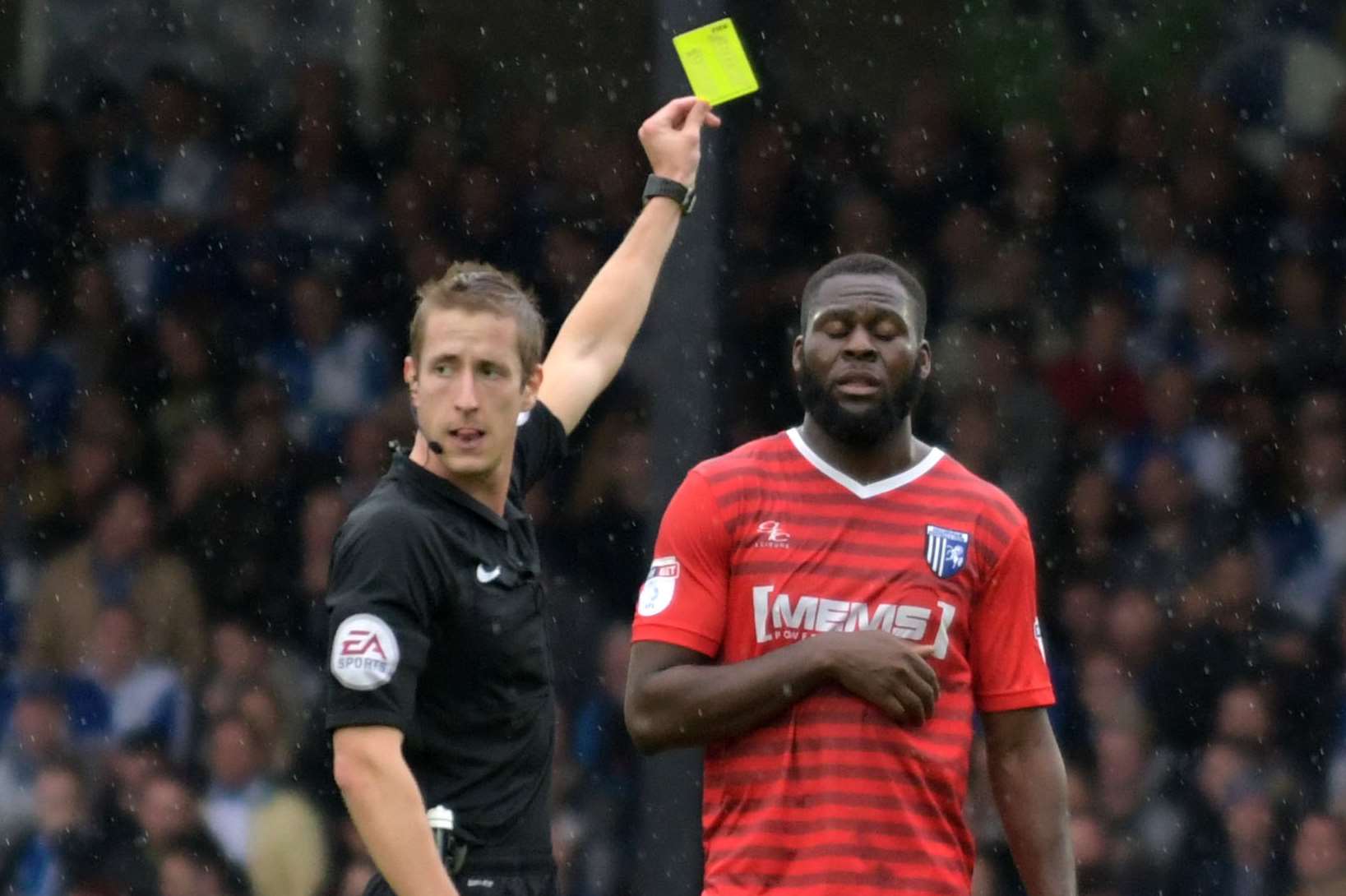 Frank Nouble gets booked Picture: Barry Goodwin