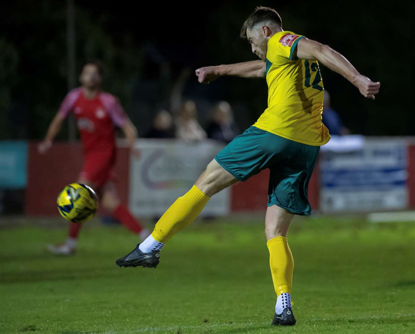 Lewis Knight fires home Ashford's last-minute equaliser at Hythe on Tuesday night. Picture: Ian Scammell