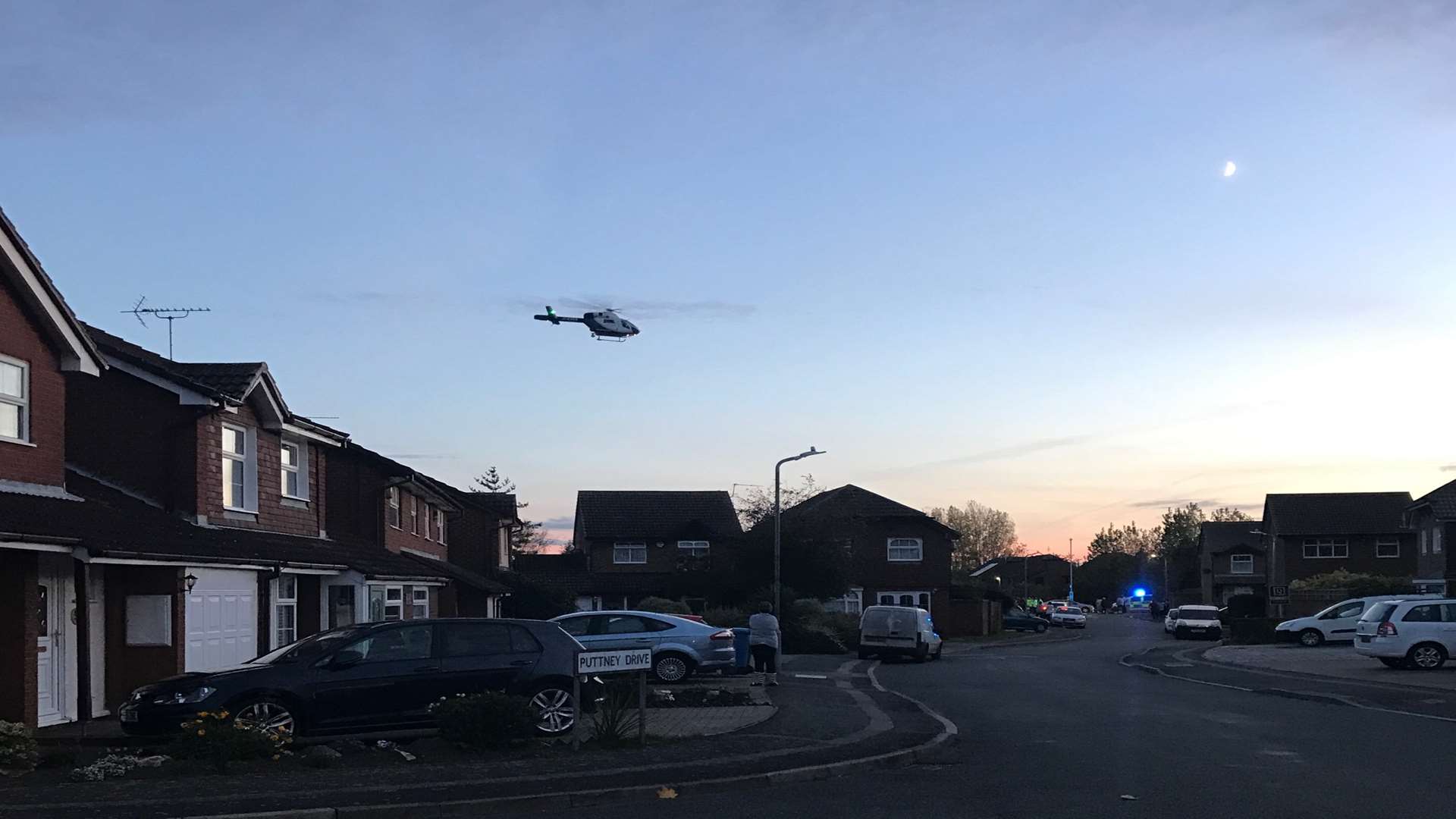 A Kent Air Ambulance helicopter seen in Newman Drive and Putney Drive, Sittingbourne, this evening.
