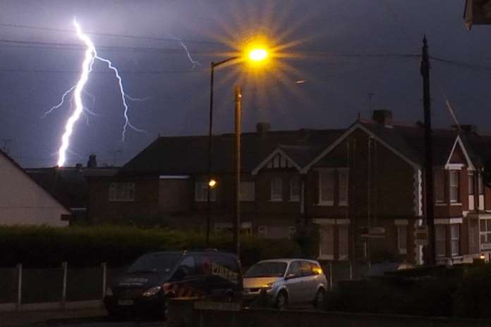 Bolt of lightning over homes in Herne Bay. Picture: Paul Darby