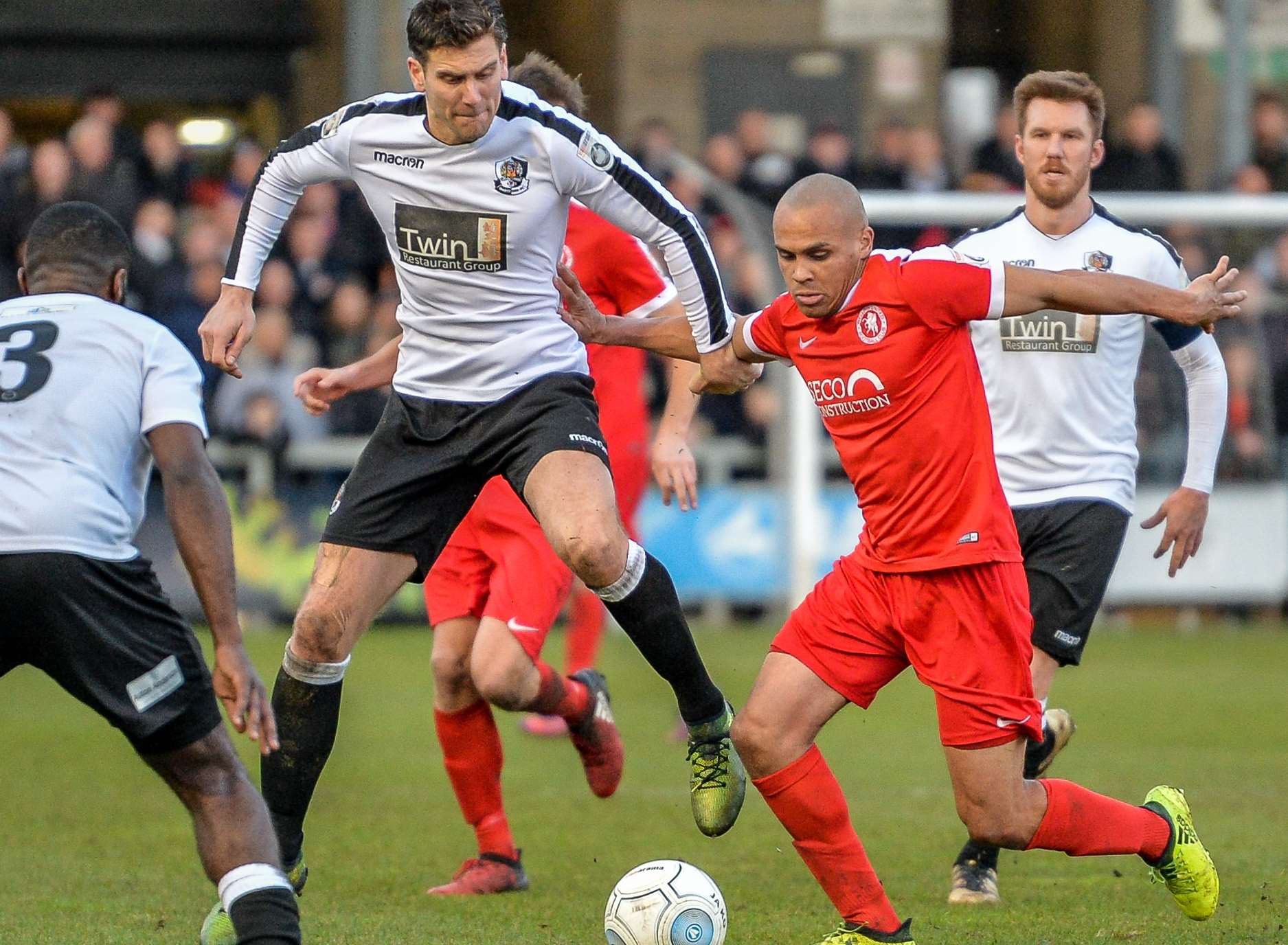 Dartford's Tom Bonner, left, clashes with Welling's Elliot Romain Picture: Dave Budden