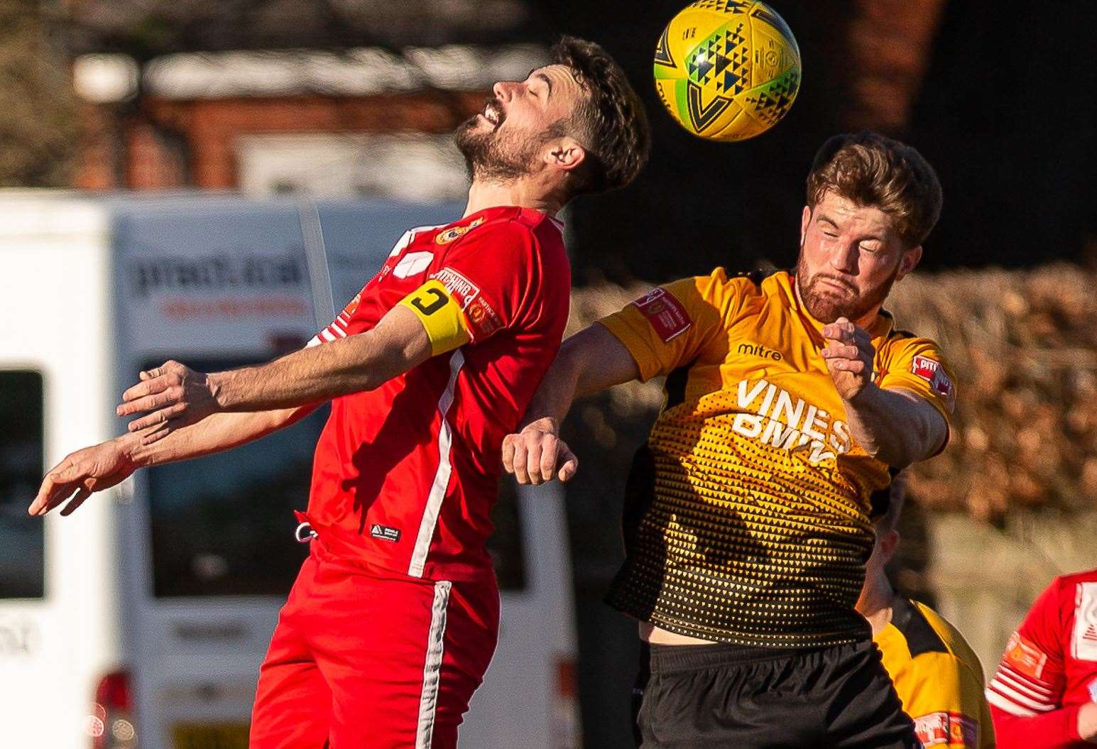 Whitstable defender Tom Mills, left, will serve a three-match ban after being sent off against Hythe. Picture: Les Biggs