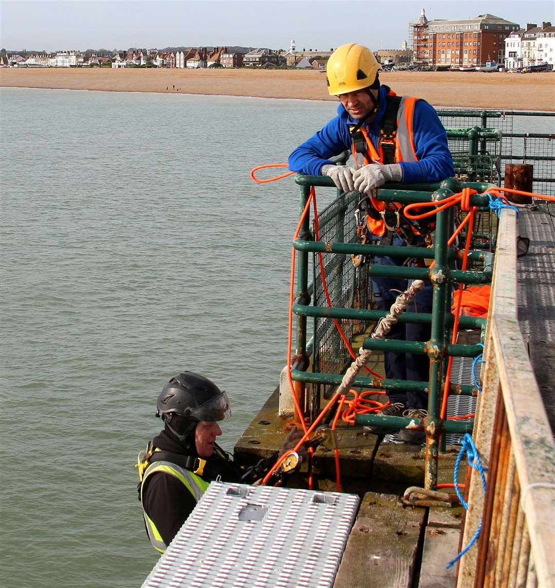 A worker starts the descent down the pier. Picture: Dover District Council