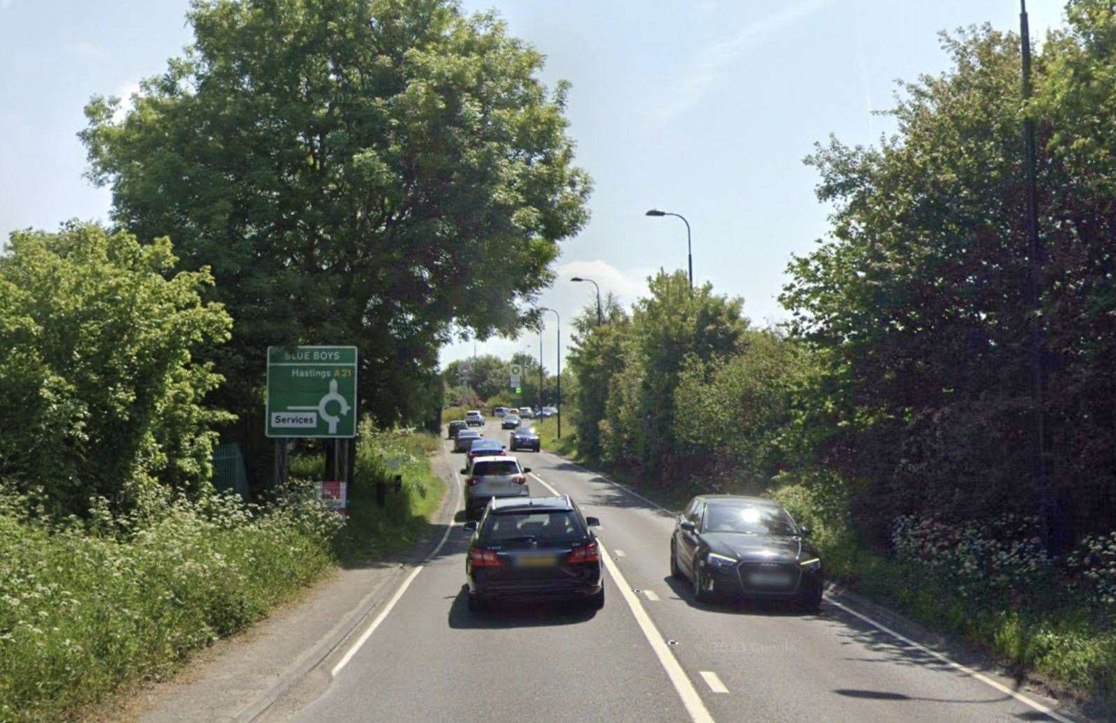 The A21 has been closed in both directions because of an accident and a fallen tree