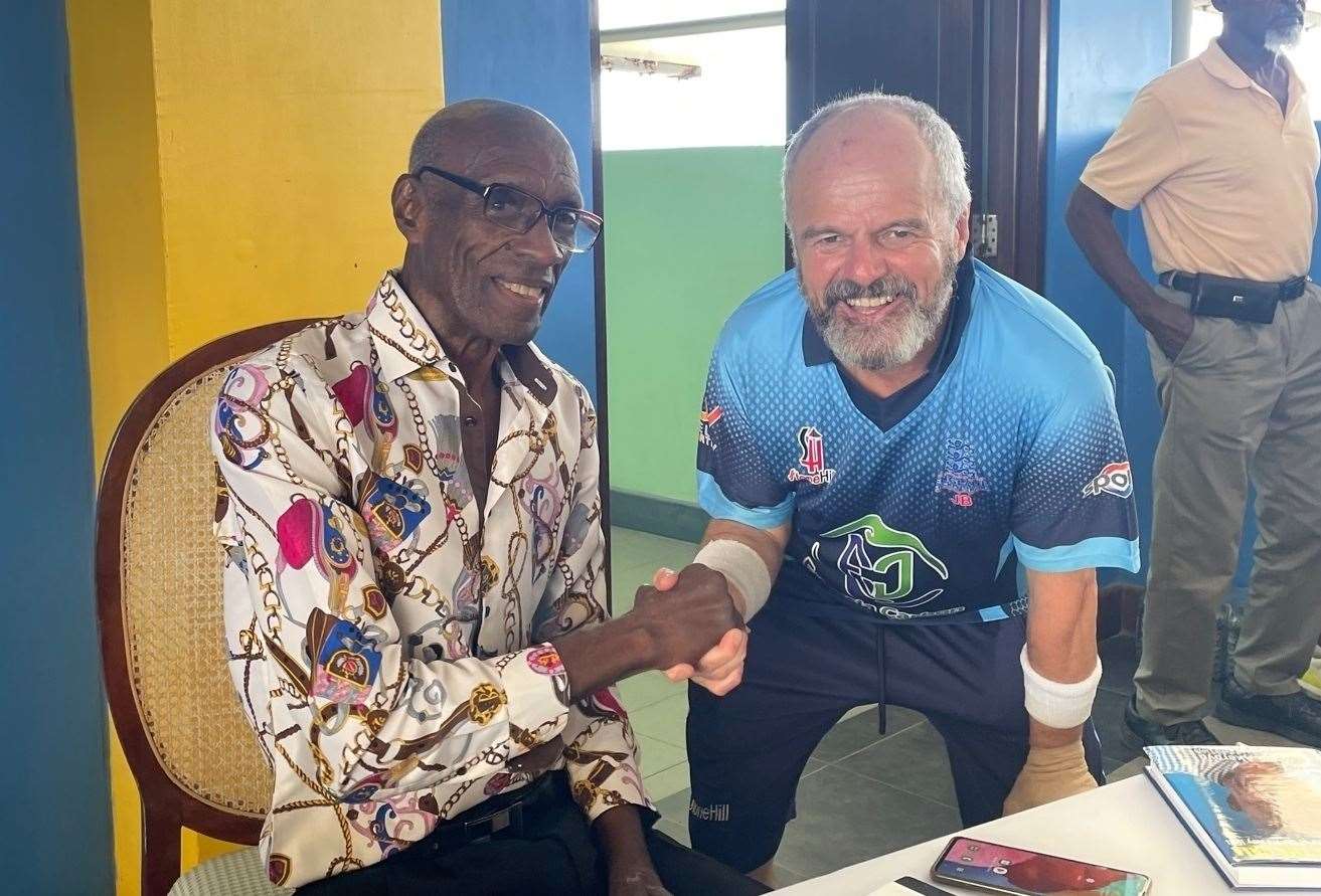 Whitstable Cricket Club's John Butterworth with former West Indies international Wes Hall