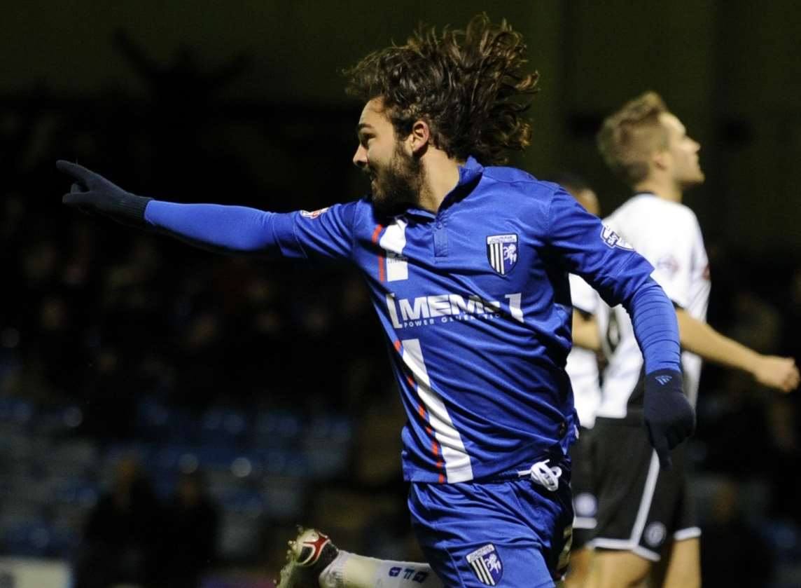 Bradley Dack celebrates scoring Gills' opener against Rochdale Picture: Barry Goodwin