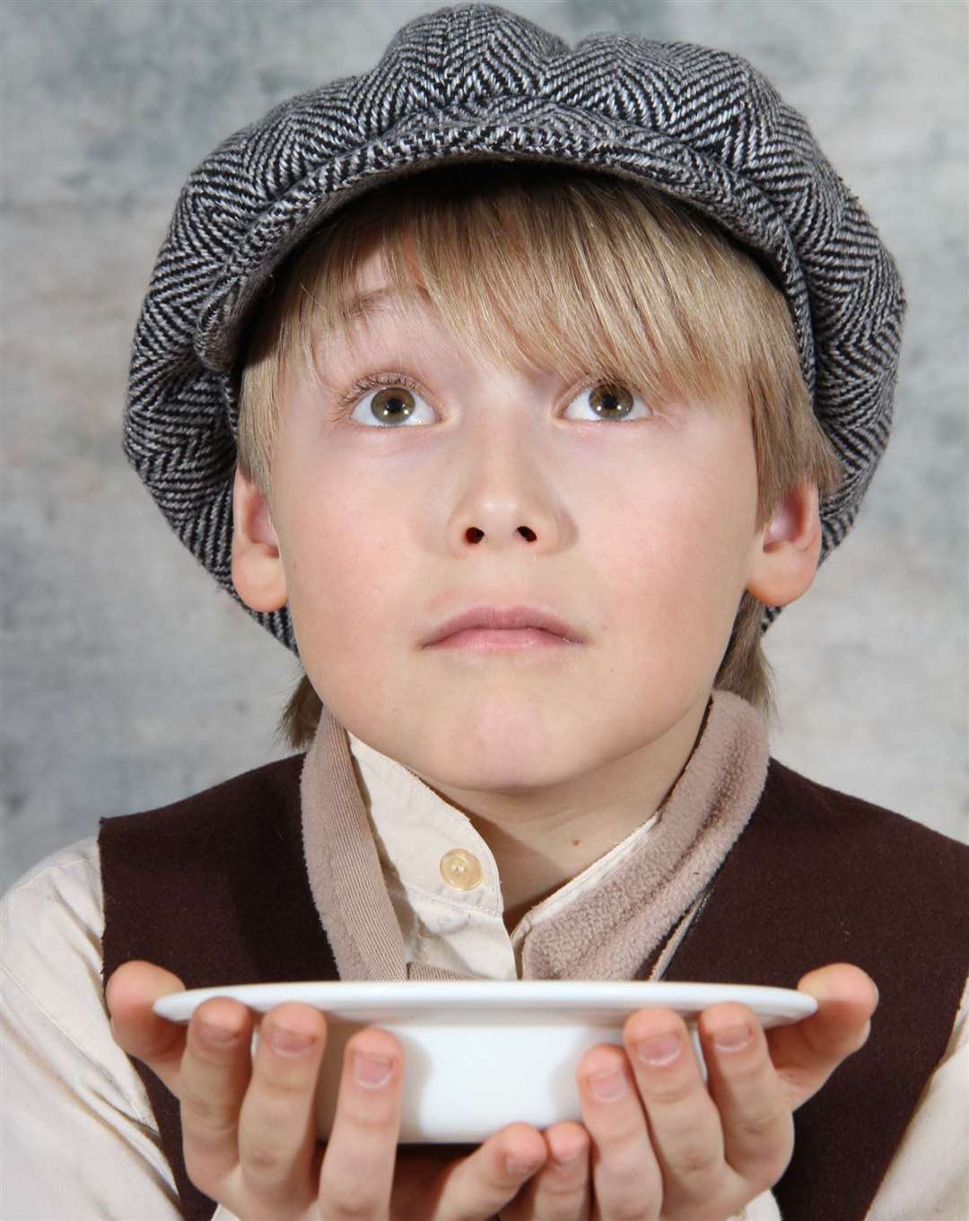 A young Tyler Rodberg, 11, paying the lead role of Oliver Twist at the Woodville Halls in 2012. Stock Picture: Roger Vaughan