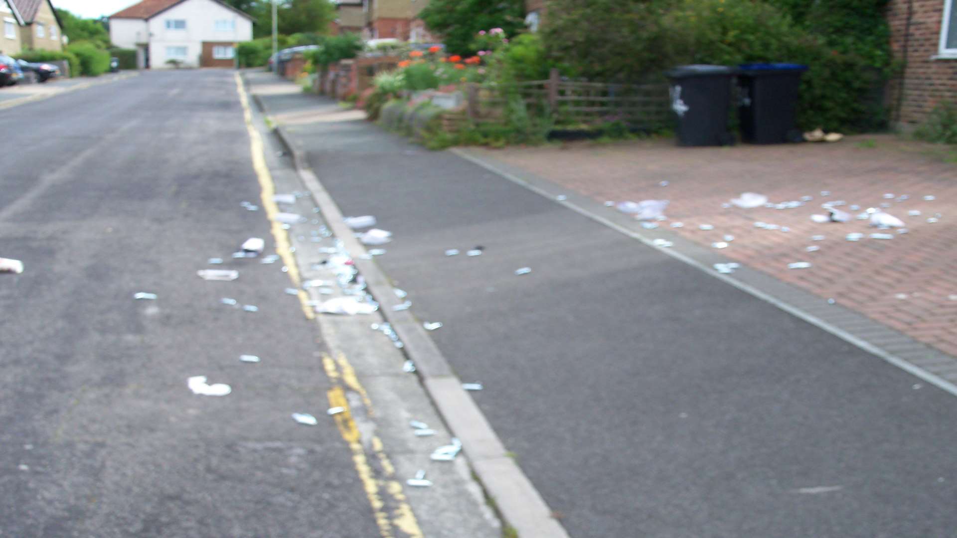 The canisters have been strewn across the road
