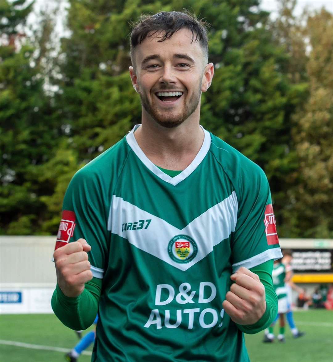 Two-goal Ashford striker Danny Parish celebrates after scoring against Merstham. Picture: Ian Scammell