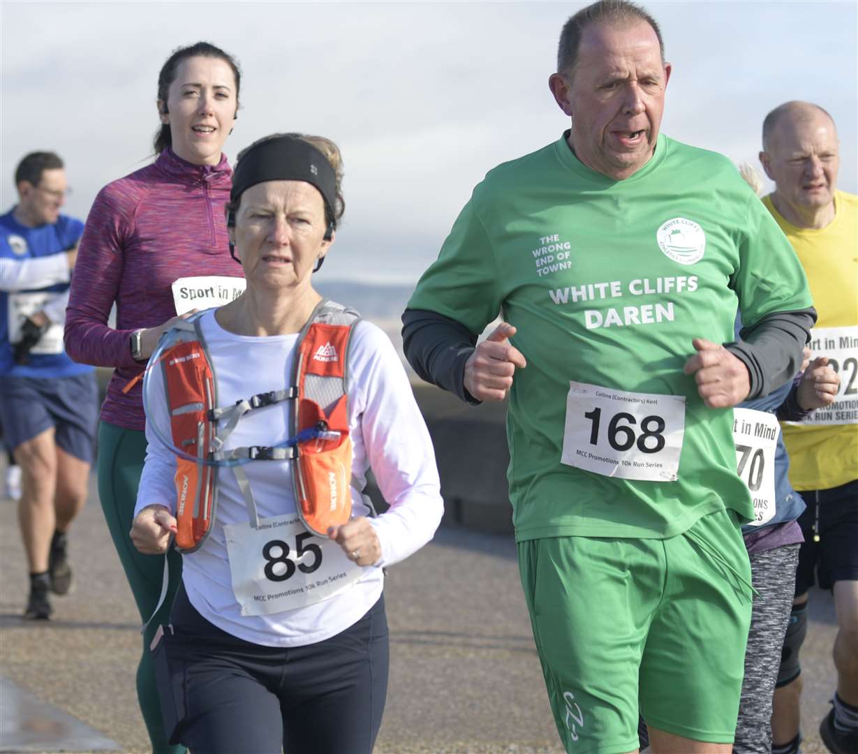 Ruth Houillon (No.85) and White Cliffs Athletics & Running Club’s Daren Screene (No.168) pick up the pace. Picture: Barry Goodwin