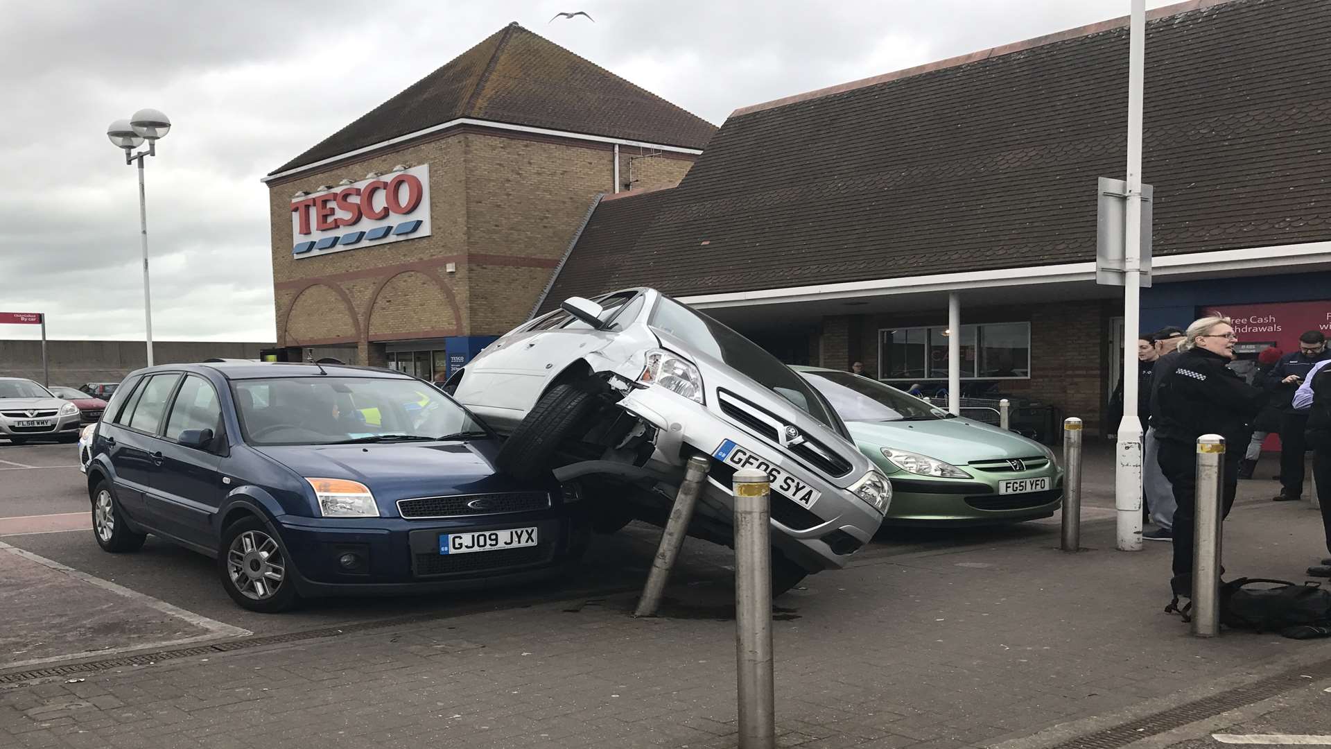 The car ended up on top of another vehicle