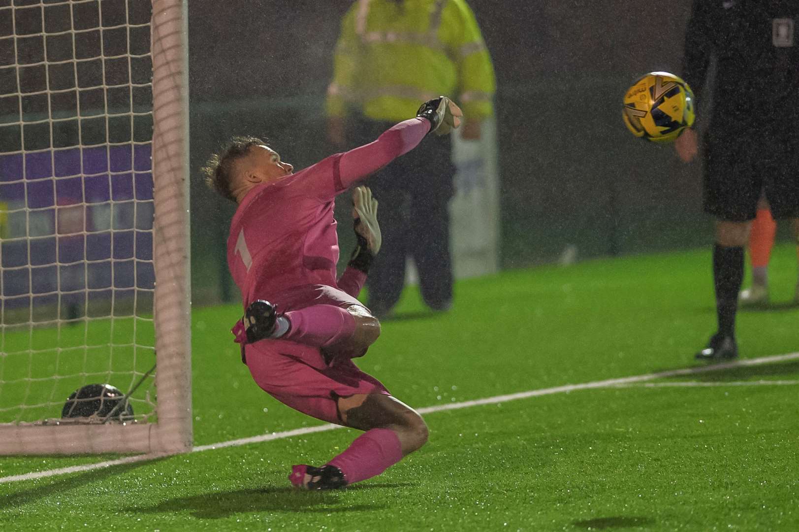 Ashford keeper Chris Lewington saves from the spot against Hastings. Picture: Ian Scammell