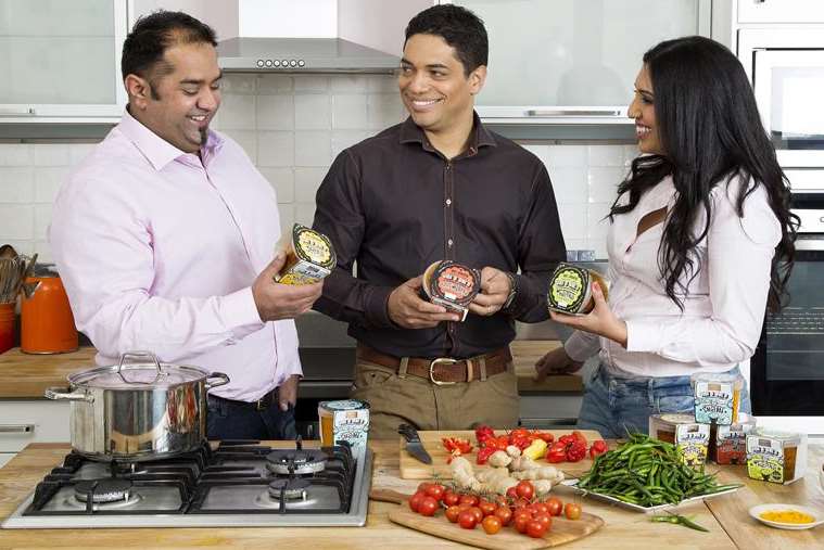 Gravesend couple Bal and Vini Aujla in the kitchen with Dragon's Den star Piers Linney