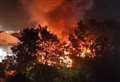 ‘Explosions’ heard as dramatic footage shows yard blaze