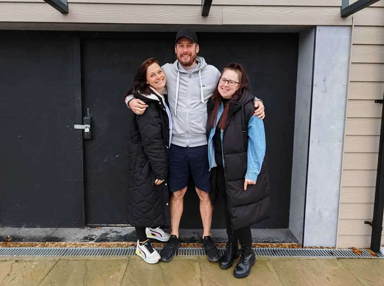 Friends Natalie Hills and Sam Holland with Natalie’s husband Dave outside the unit in Sellindge