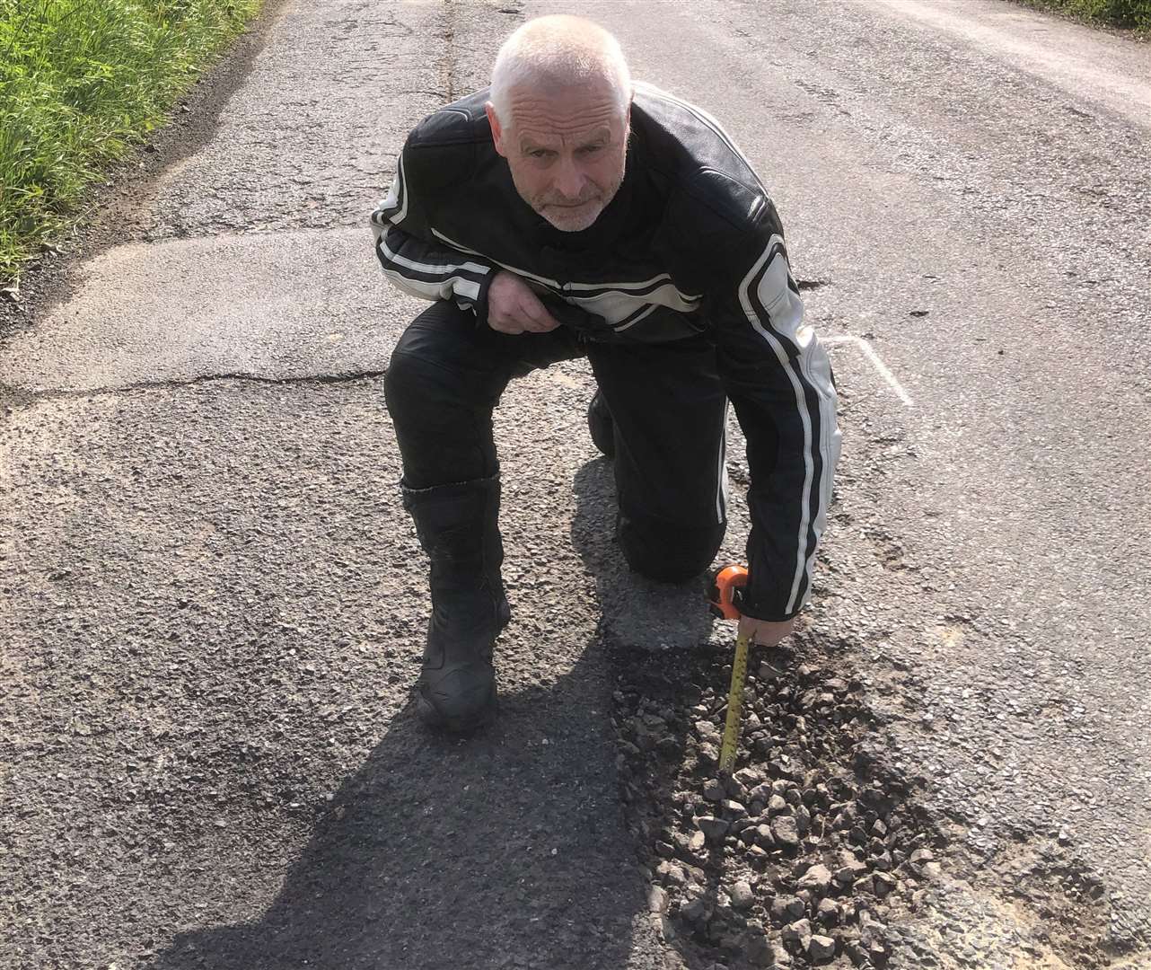 Steve Matthews wants more to be done to maintain rural roads to prevent potholes like the one on Monk's Hill in Smarden that caused £500 of damage to his bike