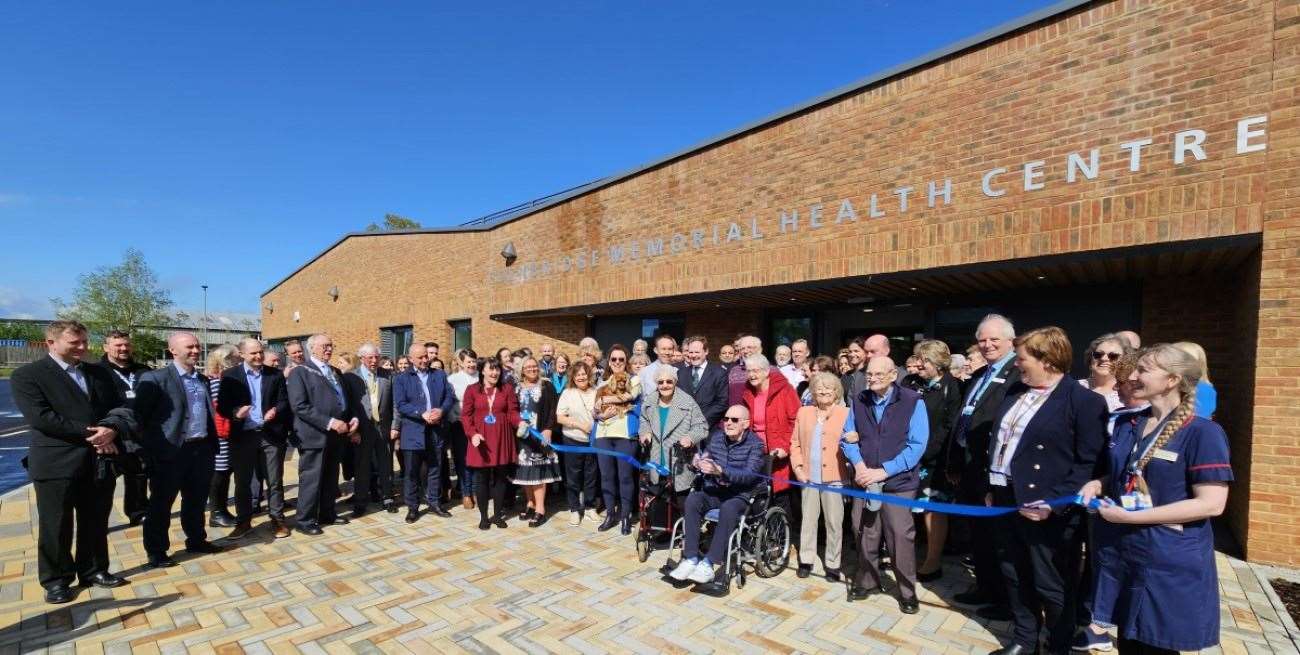 Mick Gilbert-Brown cuts the ribbon at the opening of the Edenbridge Memorial Health Centre