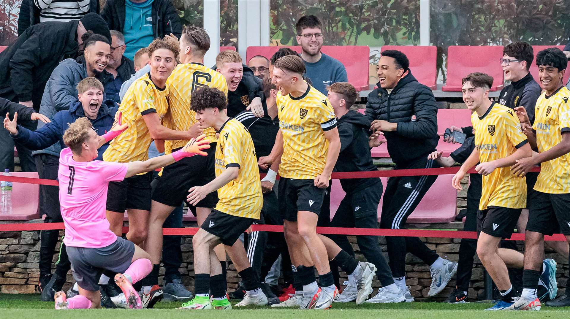 All smiles as Maidstone under-19s celebrate Riley Court’s late free-kick winner. Picture: Helen Cooper