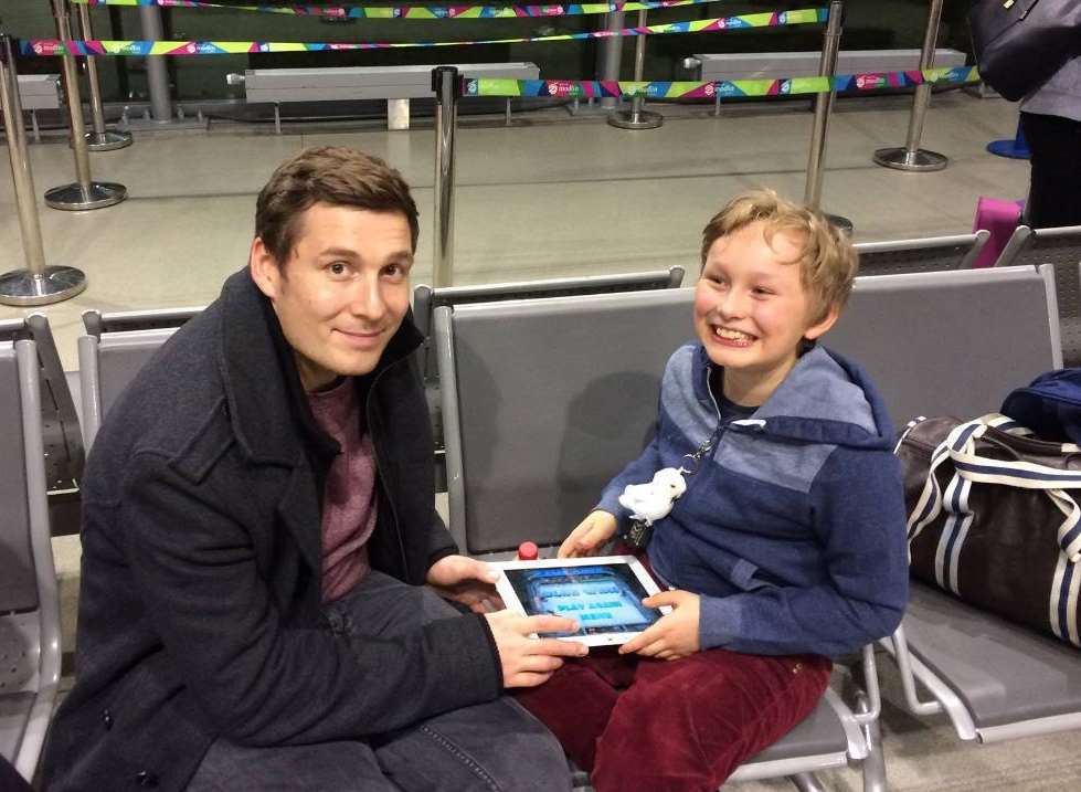 Alex and Max Bagnall at the airport, as he was coming home last December.