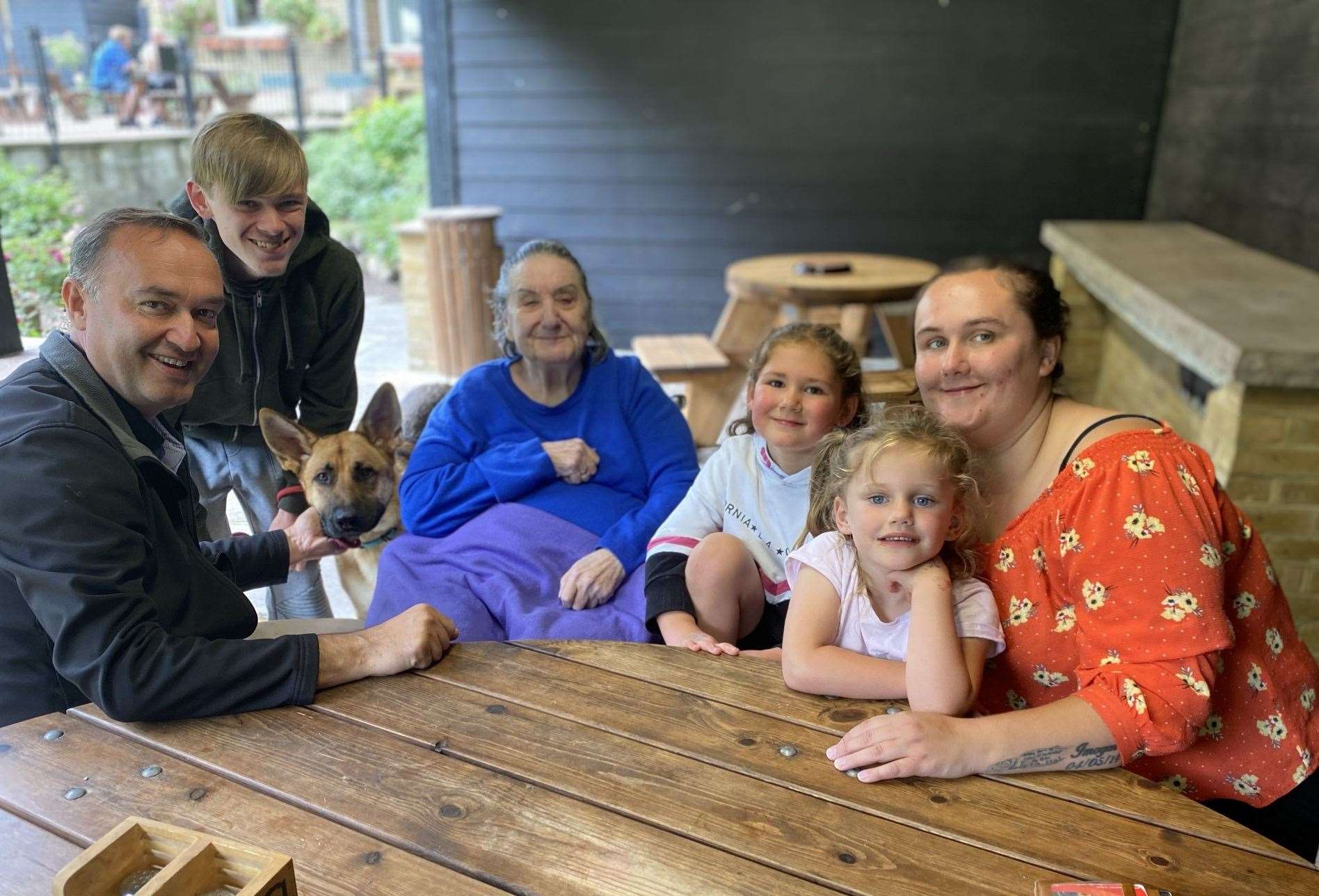 Sonia with her son Paul, grandson Josh, Bentley the dog, great grandaughters Imogen and Phoebe and grandaughter Katie