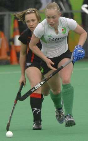 A Canterbury player (white) goes on the attack against Bowdon