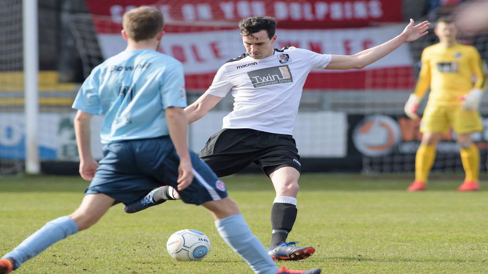 Danny Harris plays the ball forward for Dartford. Picture: Andy Payton