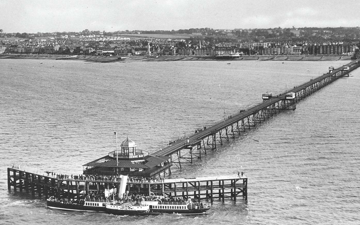 A ship docks at the pier at Herne Bay in the 1930s. Picture: Barry Mount