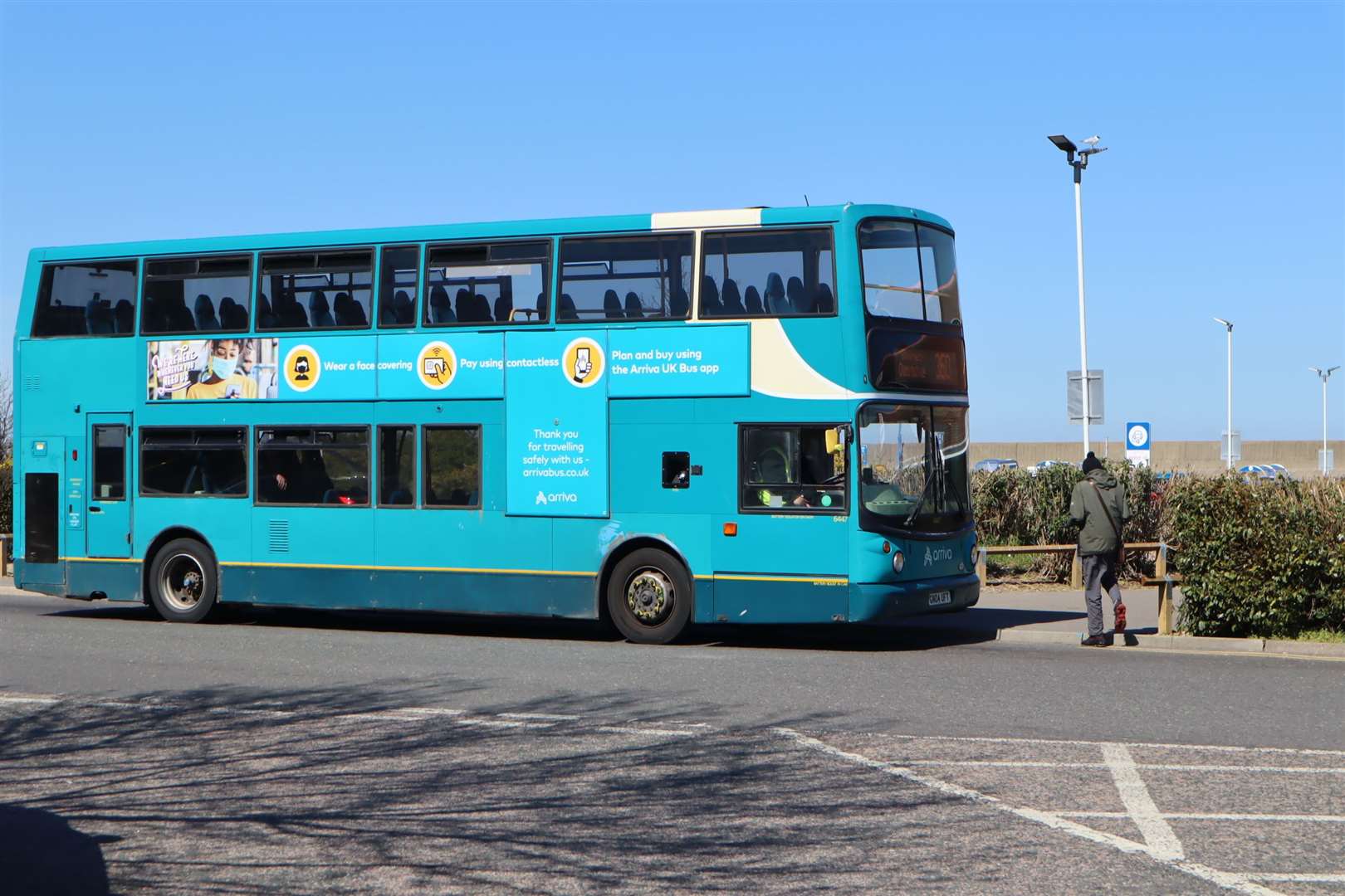 An Arriva double-decker bus leaving Tesco, Sheerness