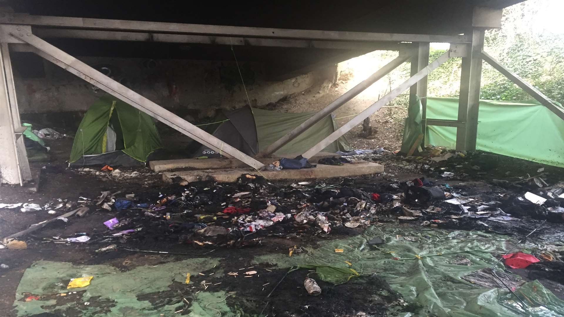 Fire ripped through a homeless encampment last night