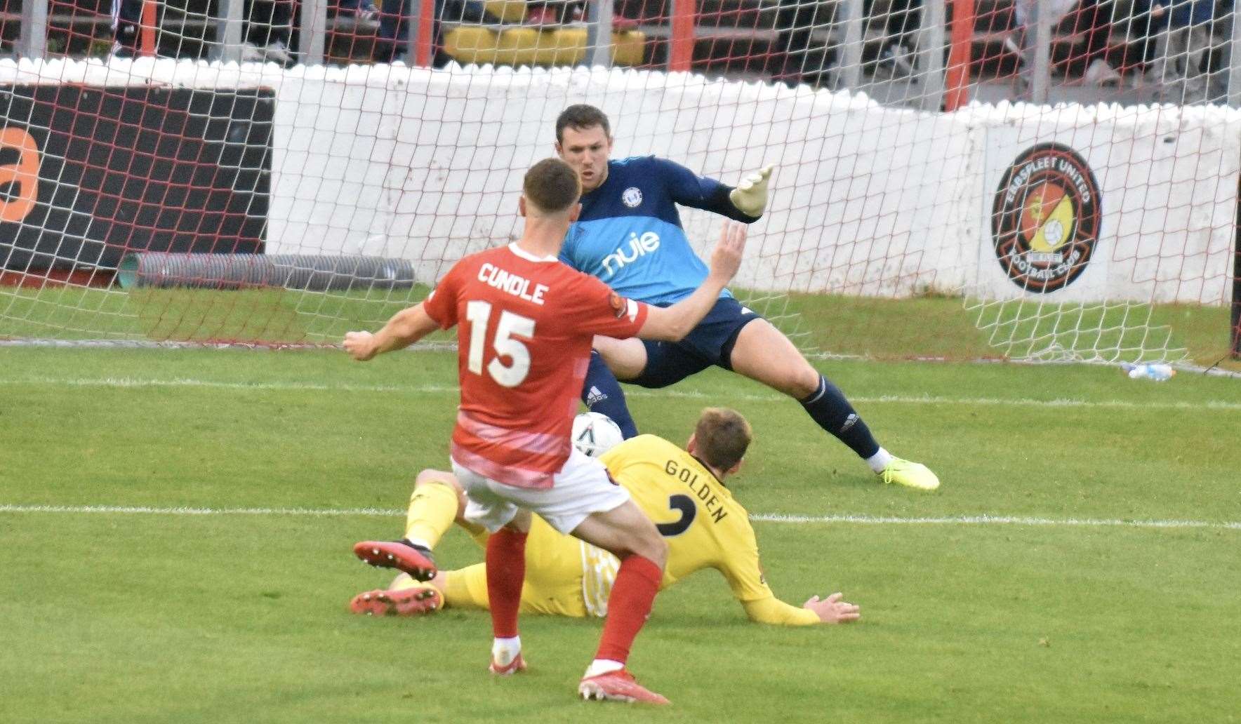 Greg Cundle's shot is saved by the legs of keeper Sam Johnson. Picture: Ed Miller/EUFC