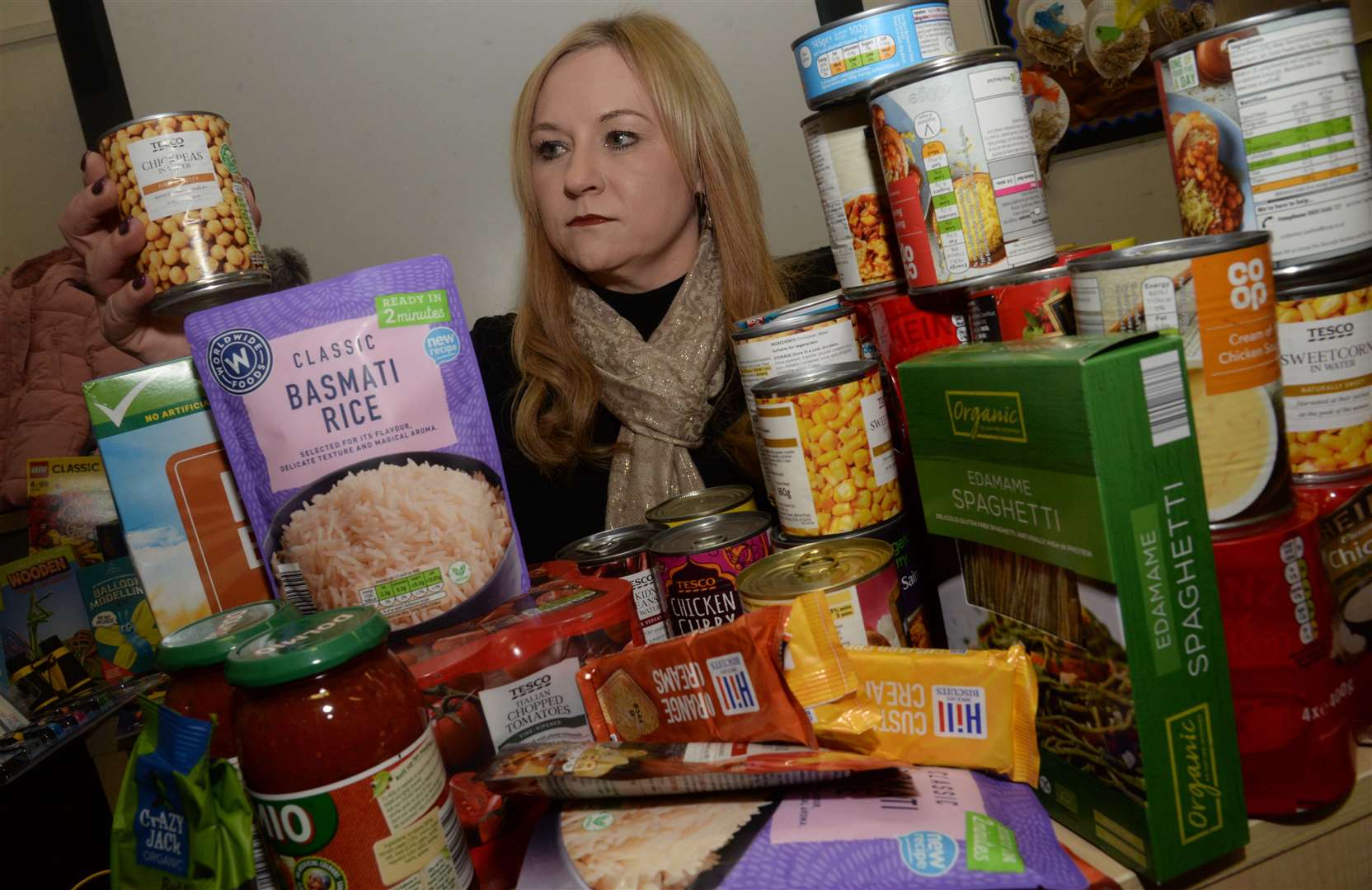 Head teacher Steph Hammond with some of the items donated to the food bank. Picture: Chris Davey