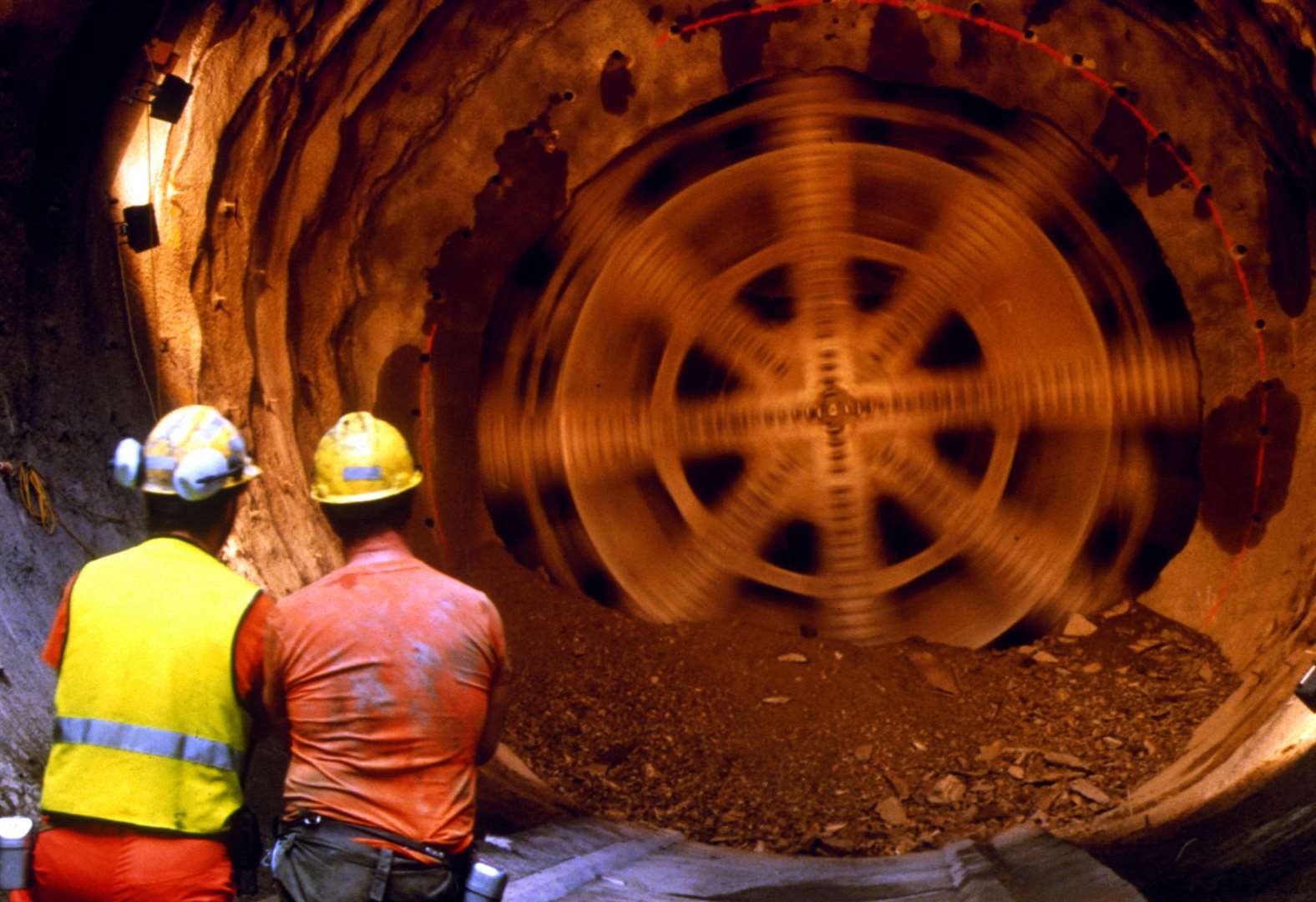 Engineers and a tunnel boring machine pictured during the construction of the Channel Tunnel. Picture: Getlink