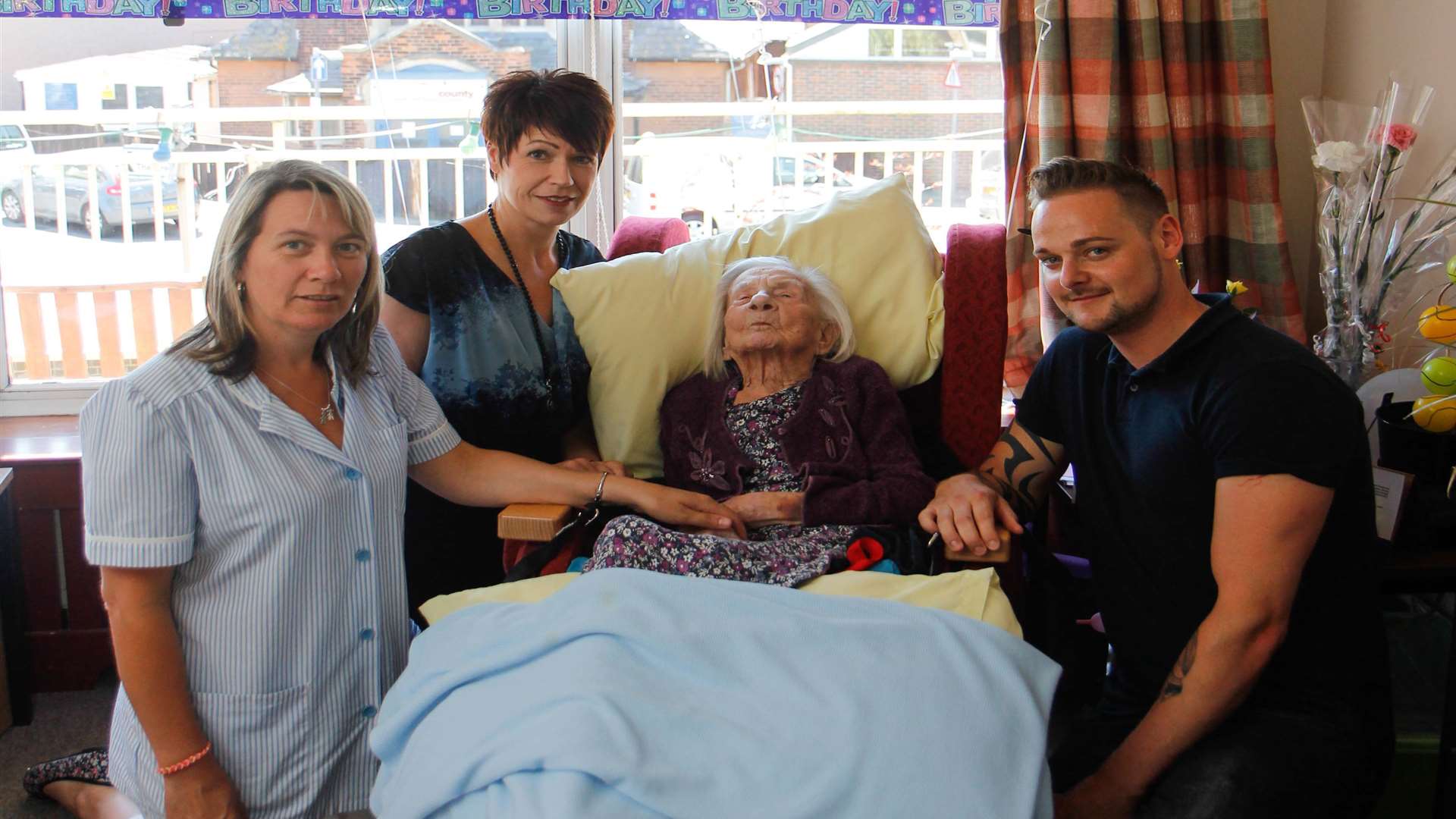 Jenny Eames, Vanessa Byrne, Nellie Morgan and Mark Lee at her 106th birthday at Blackburn Lodge