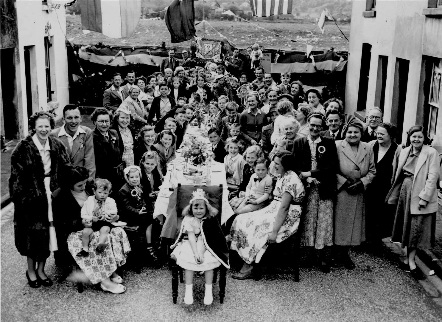Smiling faces all round at this street party in New Town Street, Canterbury, to mark the coronation in June 1953