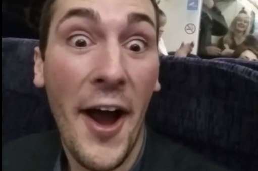 Train passenger George Haswell captured the sing-along on video