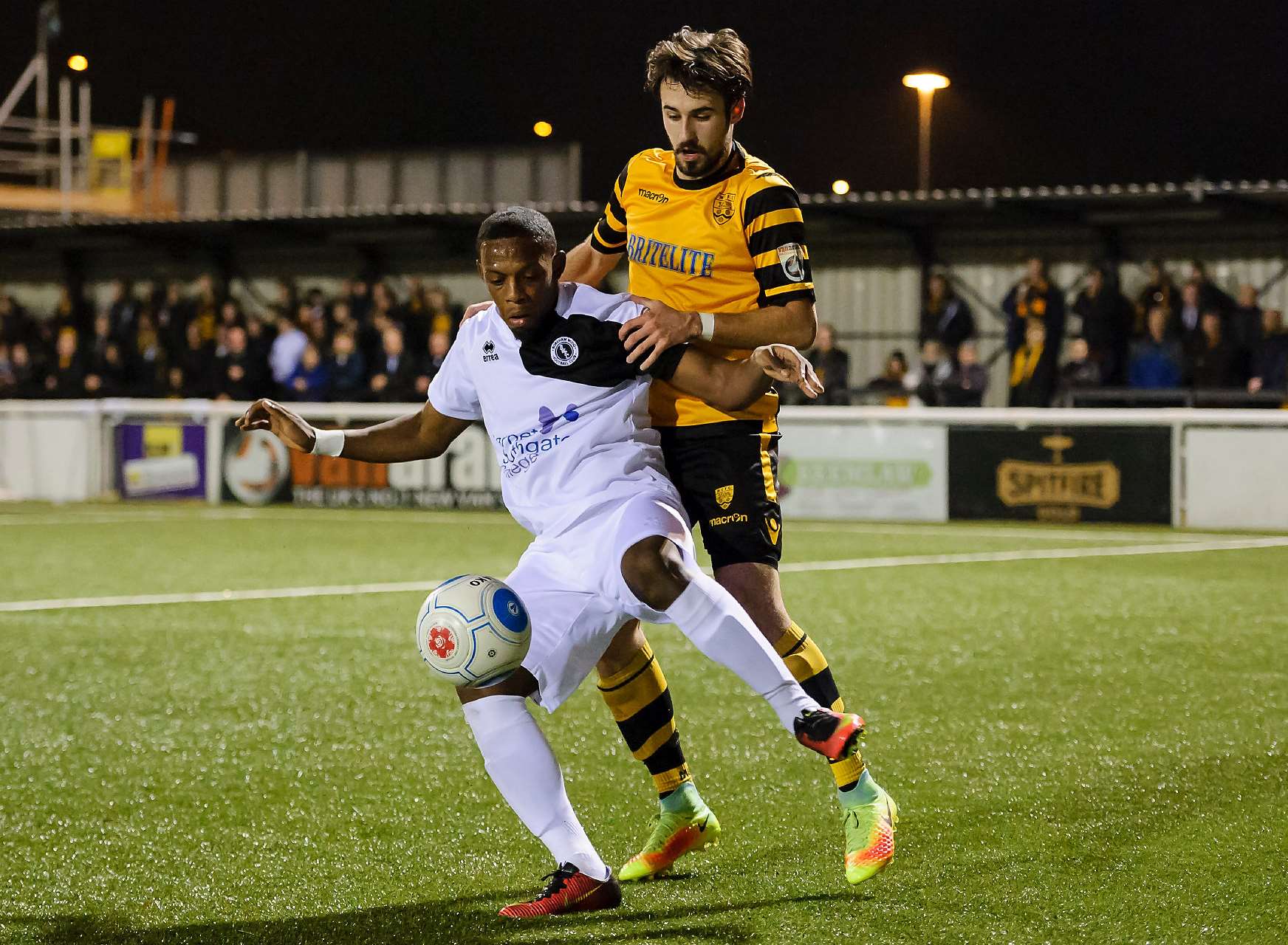 Maidstone full-back Tom Mills looks after his man Picture: Andy Payton