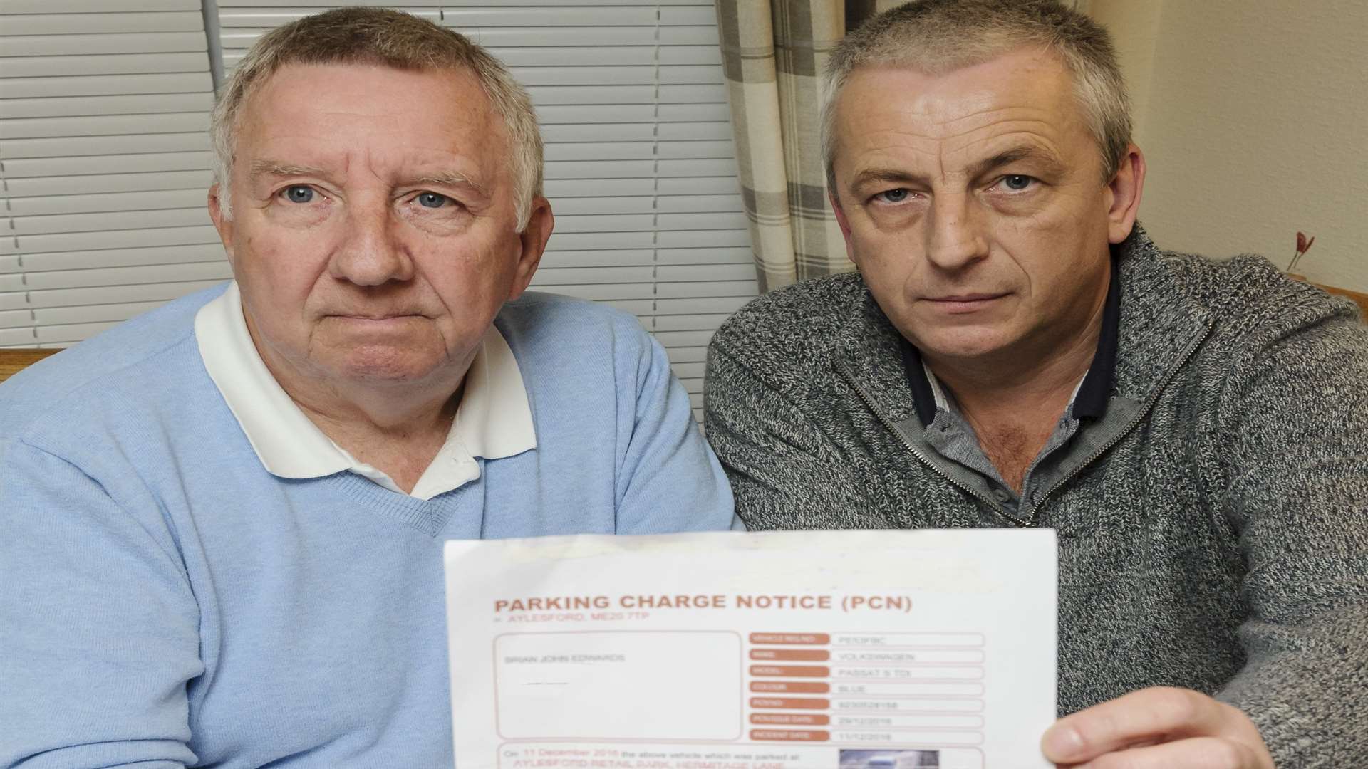 Stan Edwards, left, with son Brian, who faces a date in court over a £326 fine.
