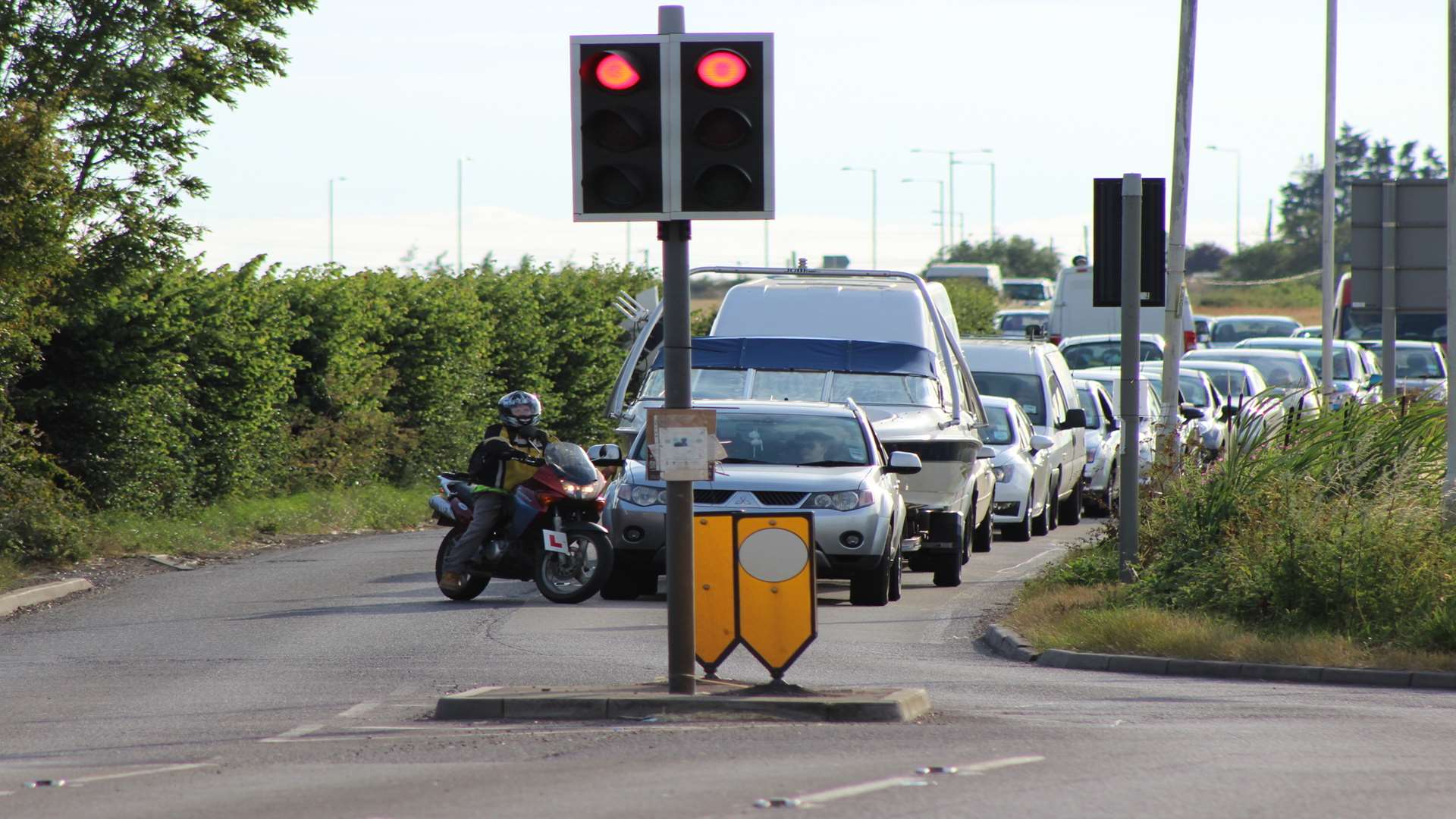 Traffic jams on Sheppey. Traffic lights at Lower Road junction with Barton Hill Drive