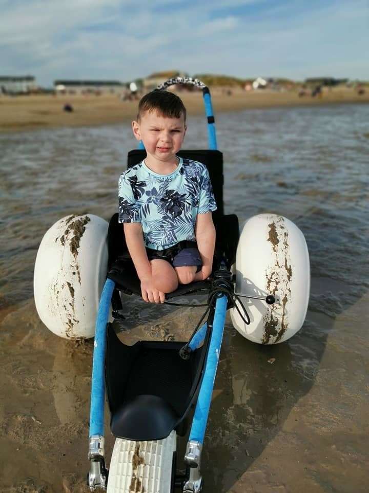 Tony Hudgell on his all-terrain wheelchair at Camber Sands (12339653)