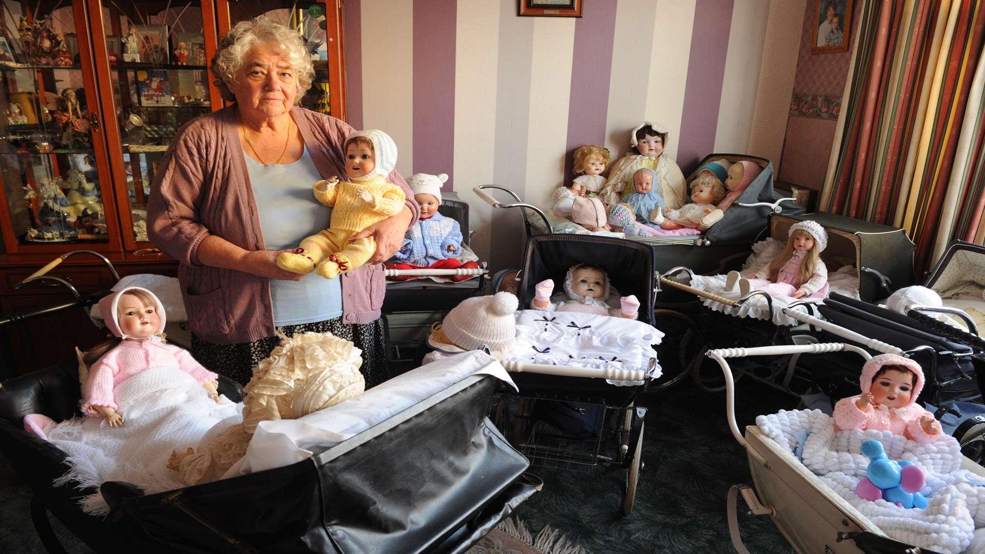 Shirley Williamson has many dolls and prams spread over four or more rooms