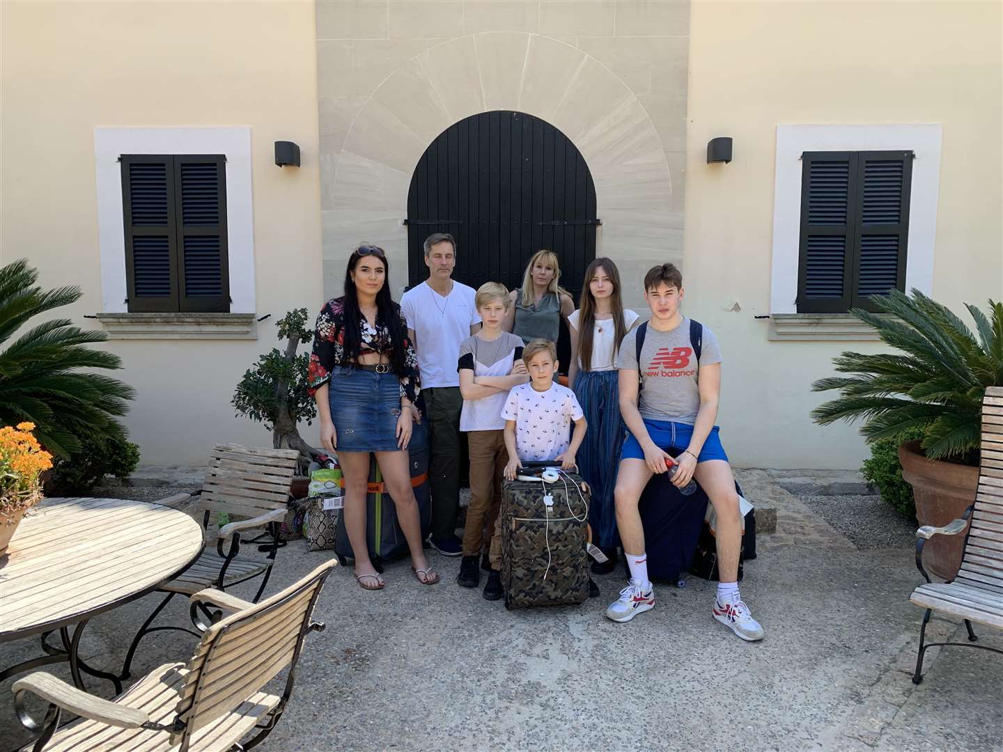 Angus Kennedy and his family outside the villa they expected to be renting. (8834300)
